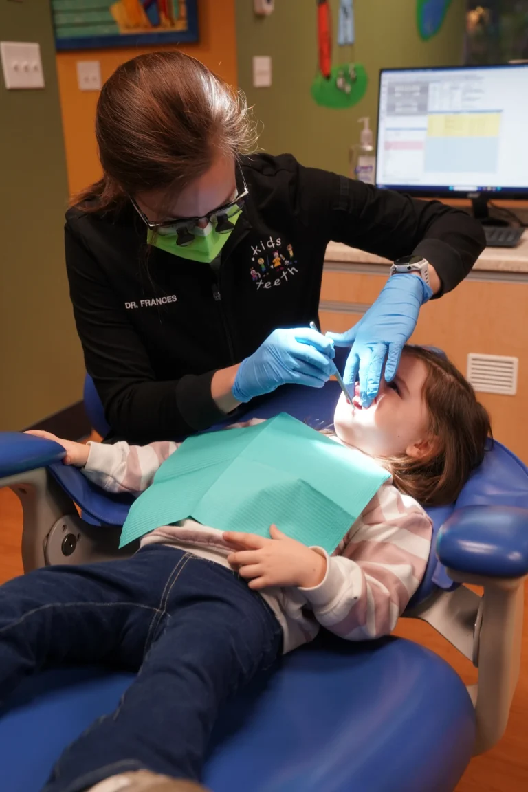 Kid in dental chair